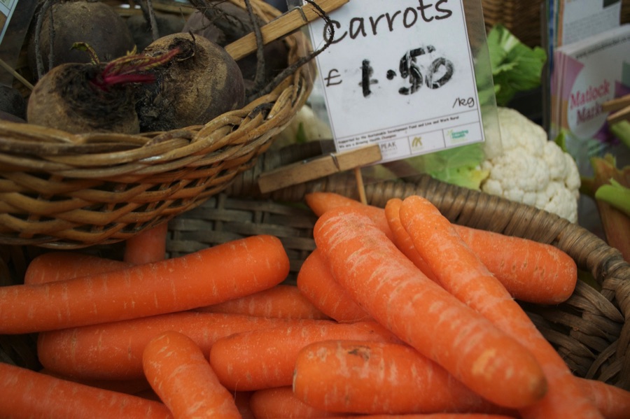 Carrots and beetroot on a market stall